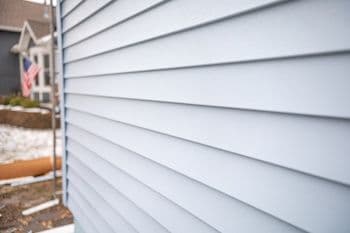 close-up-on-light-gray-siding