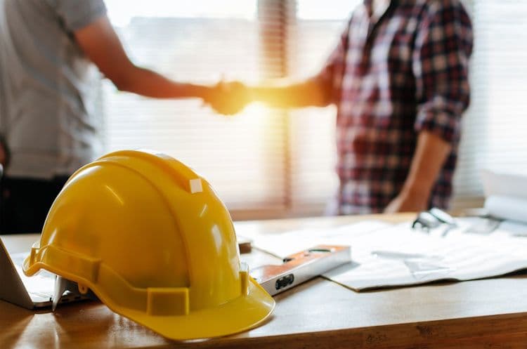 Contractors shaking hands