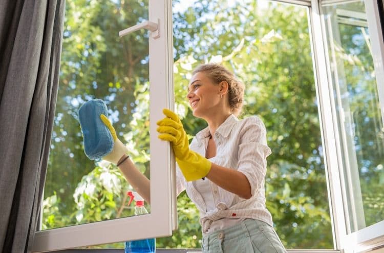 woman-cleaning-new-windows